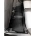 На фото показаны резиновые коврики в салоне заднего ряда с перемычкой размещенные в машине Fiat Doblo с 2015
