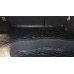 на фотографії відкритий багажник машини Ford Fusion USA у верхній частині якого лежить гумовий килимок
