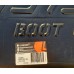 на фотографии нижняя часть коврика с наклееной этикеткой где написано ковер для багажника автомобиля Subaru Forester II UN 2002-2008
