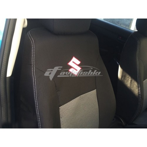 на фотографії чохол сірий одягнений на сидіння машини вгорі логотип марки Suzuki